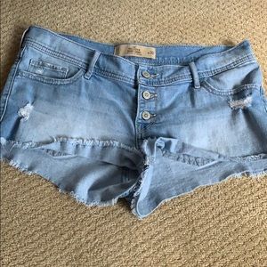 light blue low rise jean shorts